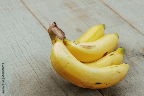 Banana on wooden floor.