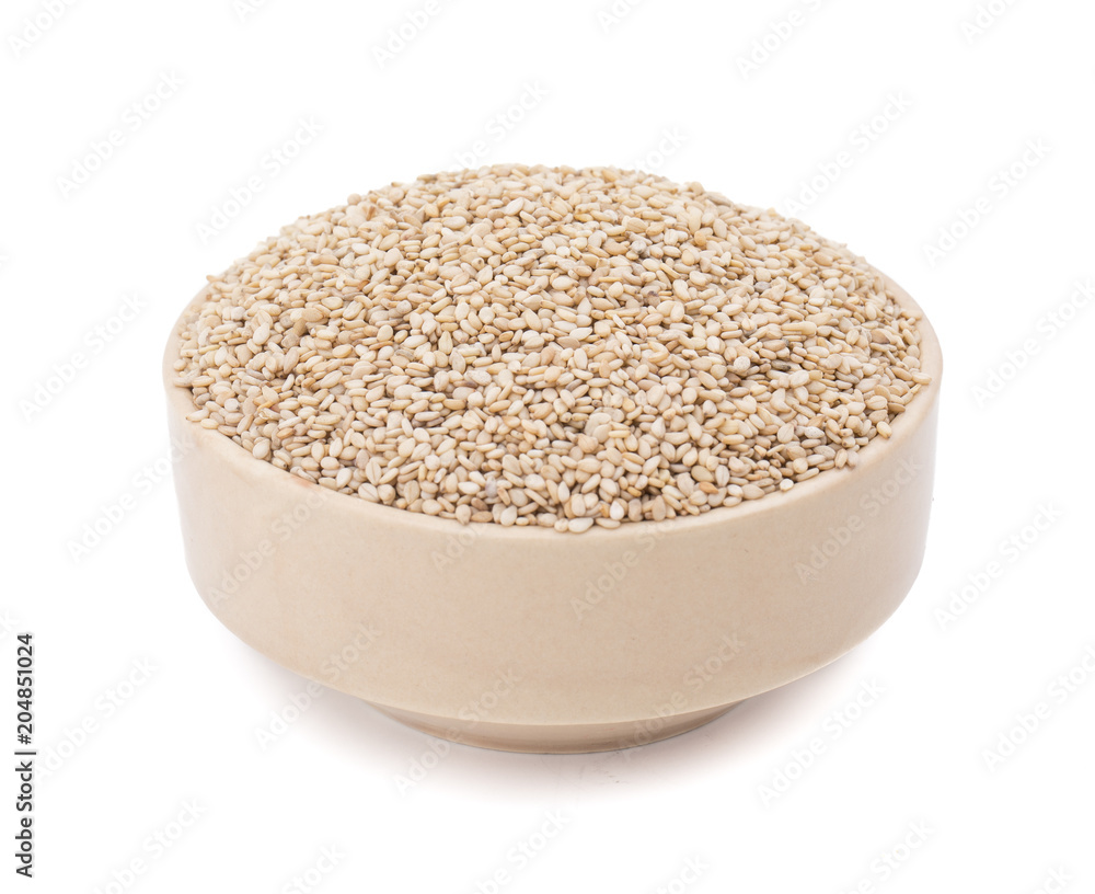 Natural Sesame Seeds in Bowl Also Know as Til in India isolated on White Background Natural Sesame Seeds in Bowl Also Know as Til in India isolated on White Background