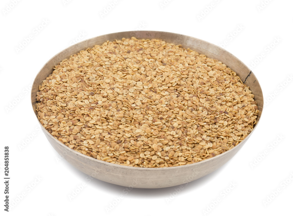 Split Roasted Coriander Seeds also know as Dhana Dal or Sukh Mukh isolated on White Background Split Roasted Coriander Seeds also know as Dhana Dal or Sukh Mukh isolated on White Background