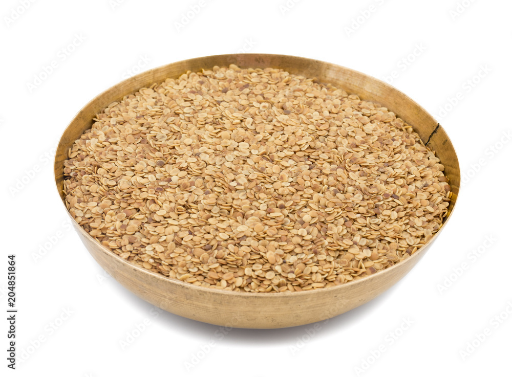 Split Roasted Coriander Seeds also know as Dhana Dal or Sukh Mukh isolated on White Background Split Roasted Coriander Seeds also know as Dhana Dal or Sukh Mukh isolated on White Background