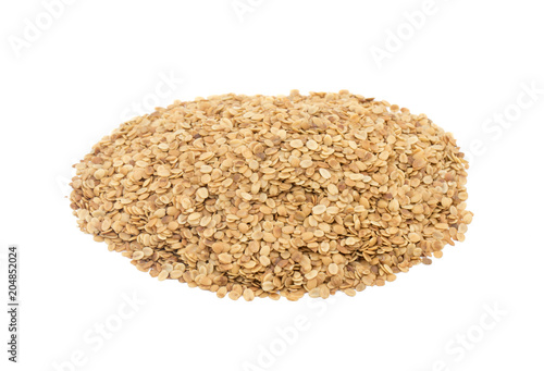 Split Roasted Coriander Seeds also know as Dhana Dal or Sukh Mukh isolated on White Background photo