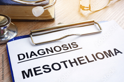 Diagnosis Mesothelioma and stethoscope on a desk. photo