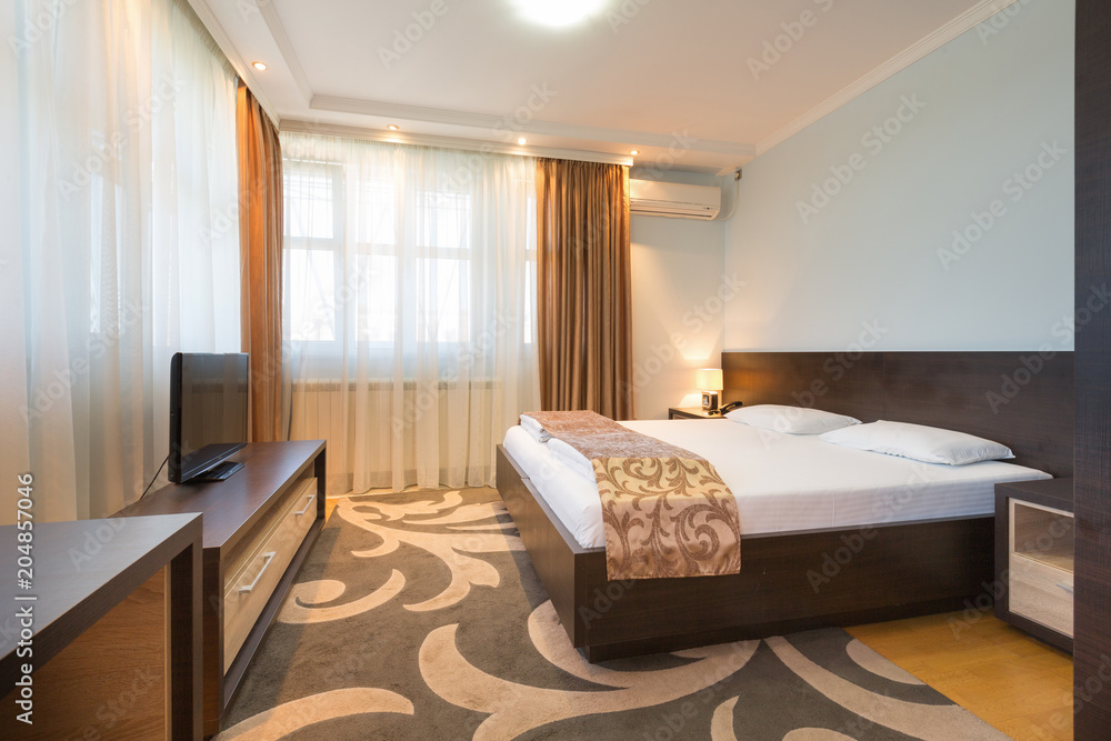 Fototapeta premium Interior of a modern luxury hotel bedroom