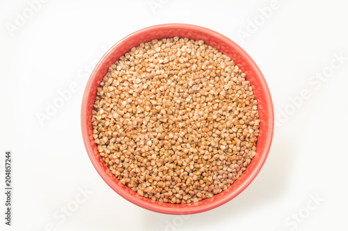 buckwheat in a plate on white background