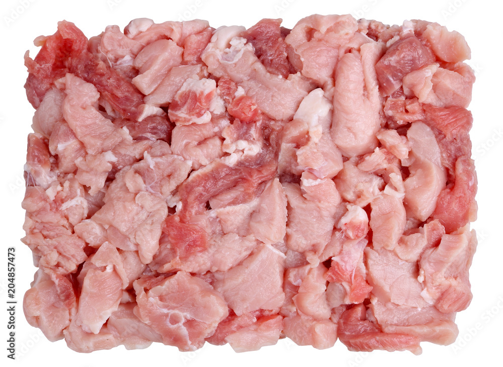 Fresh pork fillet heap is cut into small pieces for making minced meat on a grinder lie on table. Fresh pork fillet heap is cut into small pieces for making minced meat on a grinder lie on table.