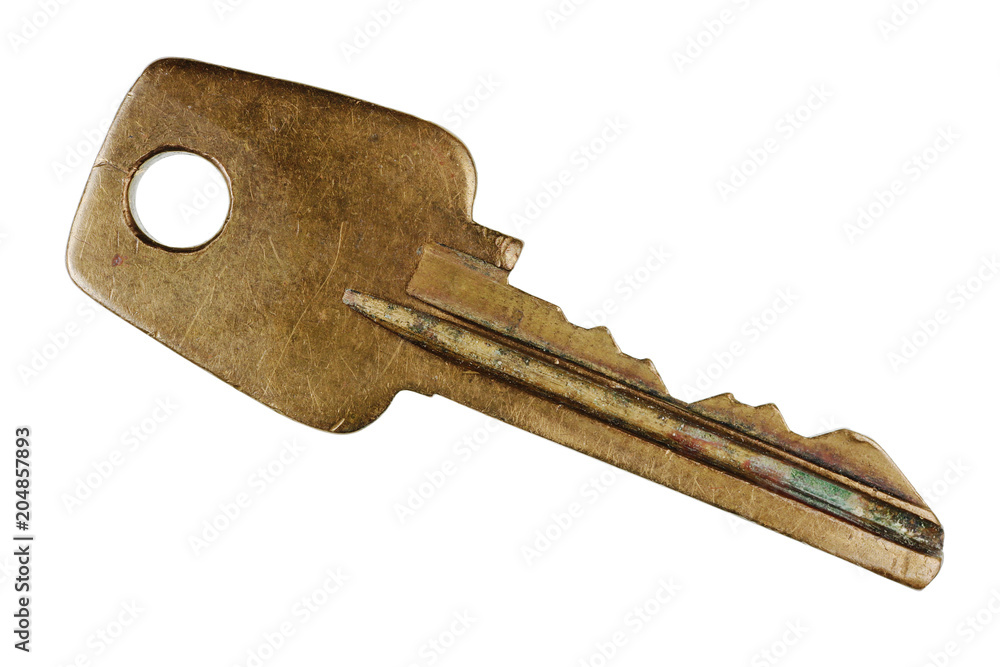 Old scratched used bronze key from the English door lock Old scratched used bronze key from the English door lock