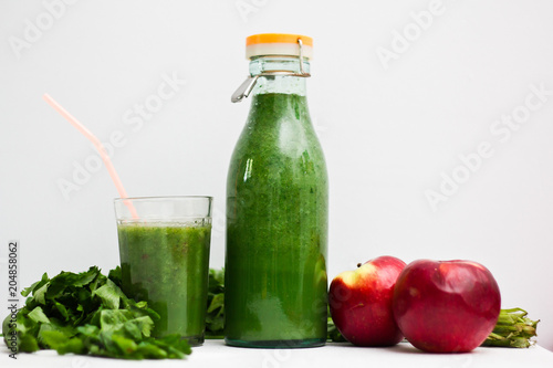 Green smoothie with sorrel, spinach and banana. in bottle. Raw vegan and healthy food. 