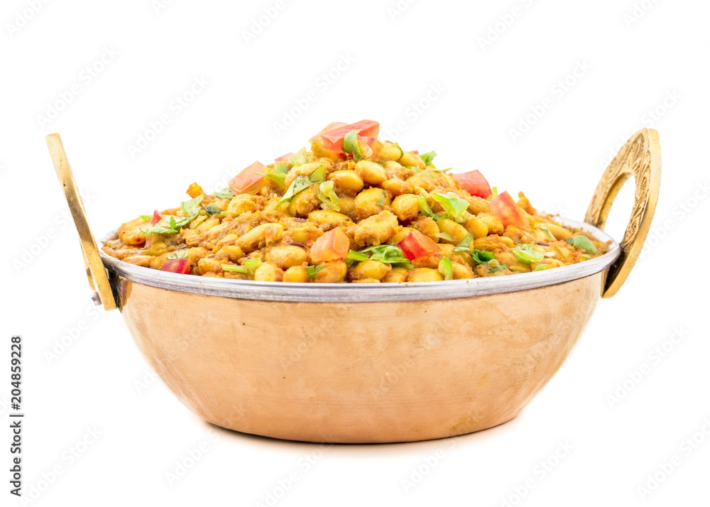 Indian Cuisine Rajma Masala or Rajmah is a South Asian Vegetarian Dish Consisting of White Kidney Beans in a thick gravy with many Indian whole spices and usually served with Chapati and food Indian Cuisine Rajma Masala or Rajmah is a South Asian Vegetarian Dish Consisting of White Kidney Beans in a thick gravy with many Indian whole spices and usually served with Chapati and food