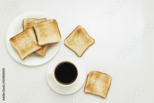 Toast and coffee on a white background.