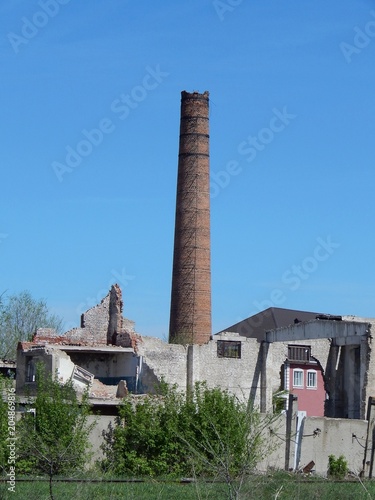 Brick factory chimney. Abandoned enterprise. The old boiler plant.