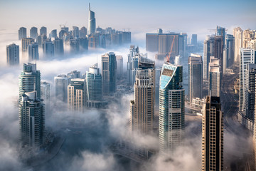 Wandcirkels Dubai Mistige luchtfoto Dubai Marina  © Monica
