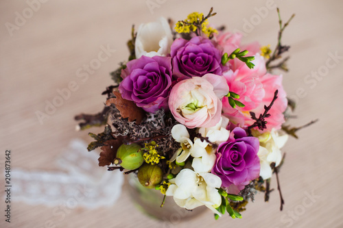 Wedding bouquet of fresh tulips  peonies  roses and forest moss  close 