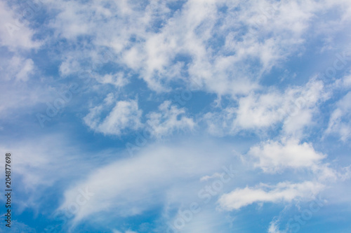 Fototapeta Naklejka Na Ścianę i Meble -  Clouds on a blue sky as a background