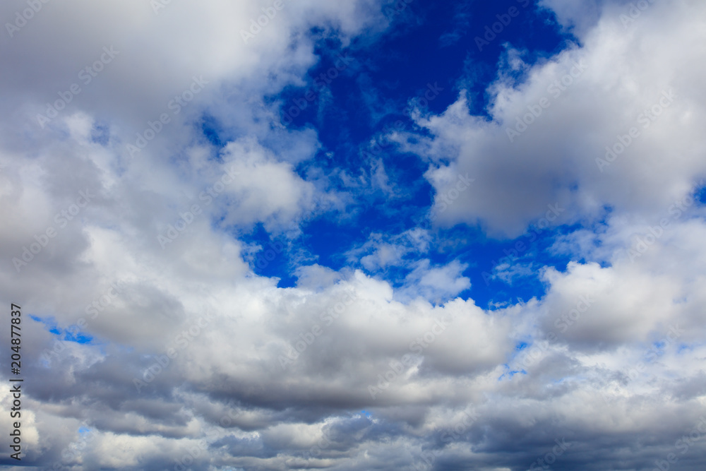 Fototapeta premium Clouds on a blue sky as a background