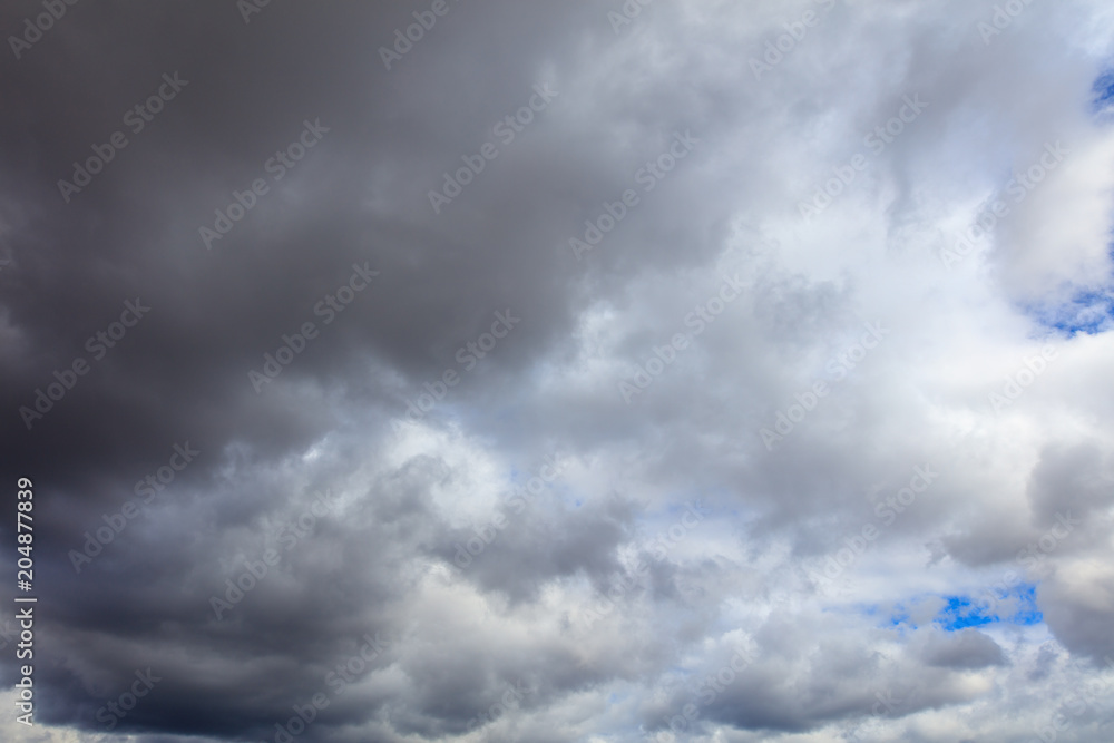 Obraz premium Clouds before the rain as a background