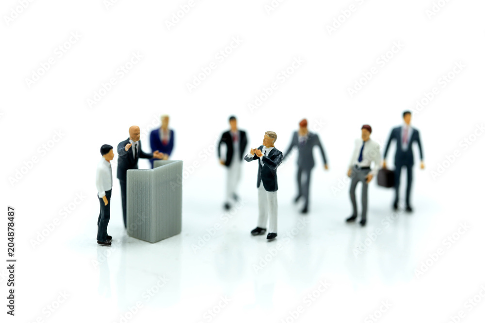 Miniature people : Businessman Leads Meeting Conference Discussion Corporate Concept. Miniature people : Businessman Leads Meeting Conference Discussion Corporate Concept.