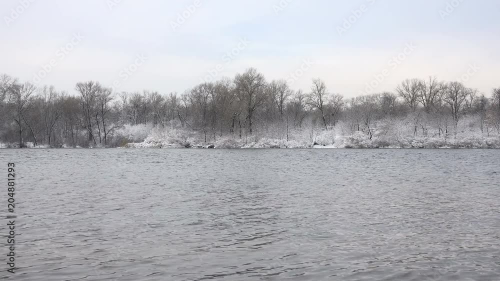 Tranquil Snow Covered Winter Park or Forest with River. 4K Ultra HD Tranquil Snow Covered Winter Park or Forest with River. 4K Ultra HD