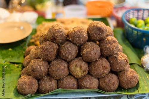 Fried rice ball for sale at fresh food market photo