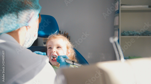 Little child in stomatology chair - close up