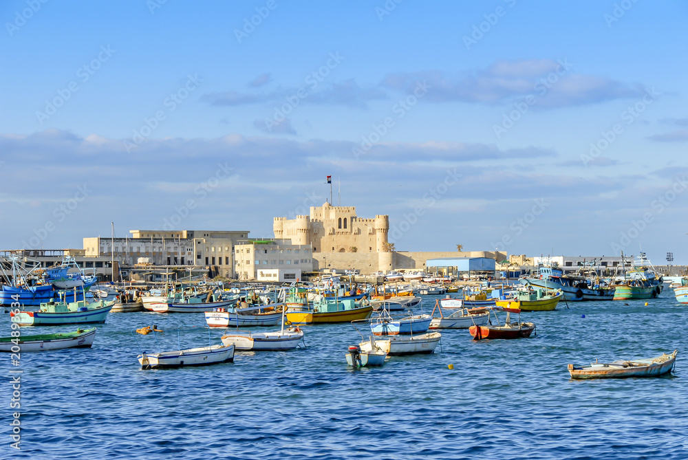 Alexandria, Egypt, 21 February 2018: Qaitbay Citadel and sandals