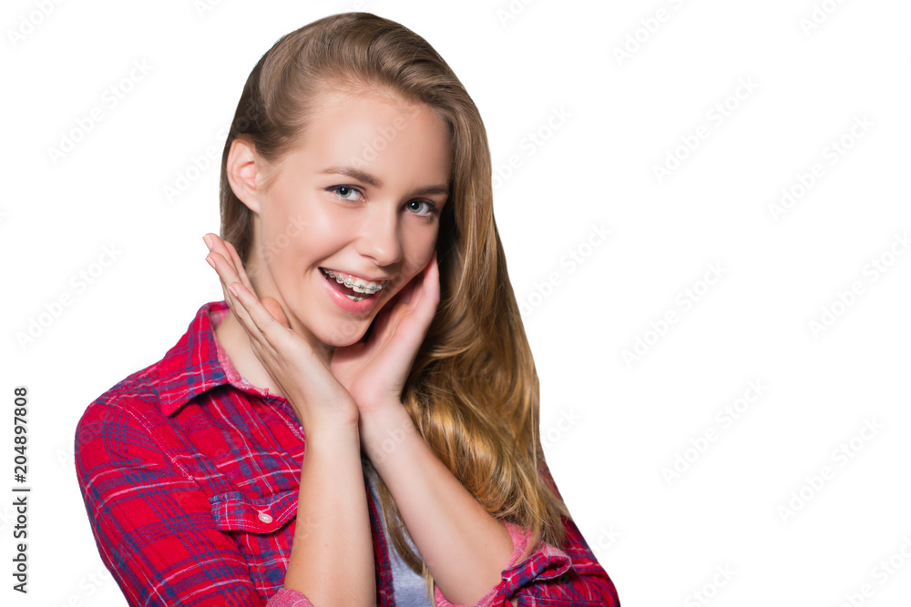 Portrait of teen girl showing dental braces. Portrait of teen girl showing dental braces.