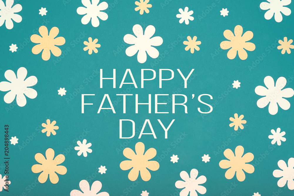 Happy Father's Day pastel coloured background. Beautiful floral flat lay. Fathers day greeting card.