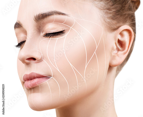 Graphic lines showing facial lifting effect on skin. photo