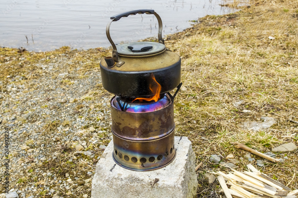 Camping wood gas stove with a kettle Camping wood gas stove with a kettle