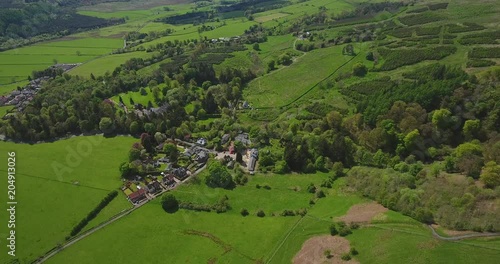 Aerial footage of the hamlet of Clachan of Campsie, near Lennoxtown and the Campsie Fells. photo