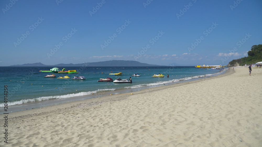 Obraz premium Beautiful tropical beach with white sand. White Beach, Philippines, Mindoro