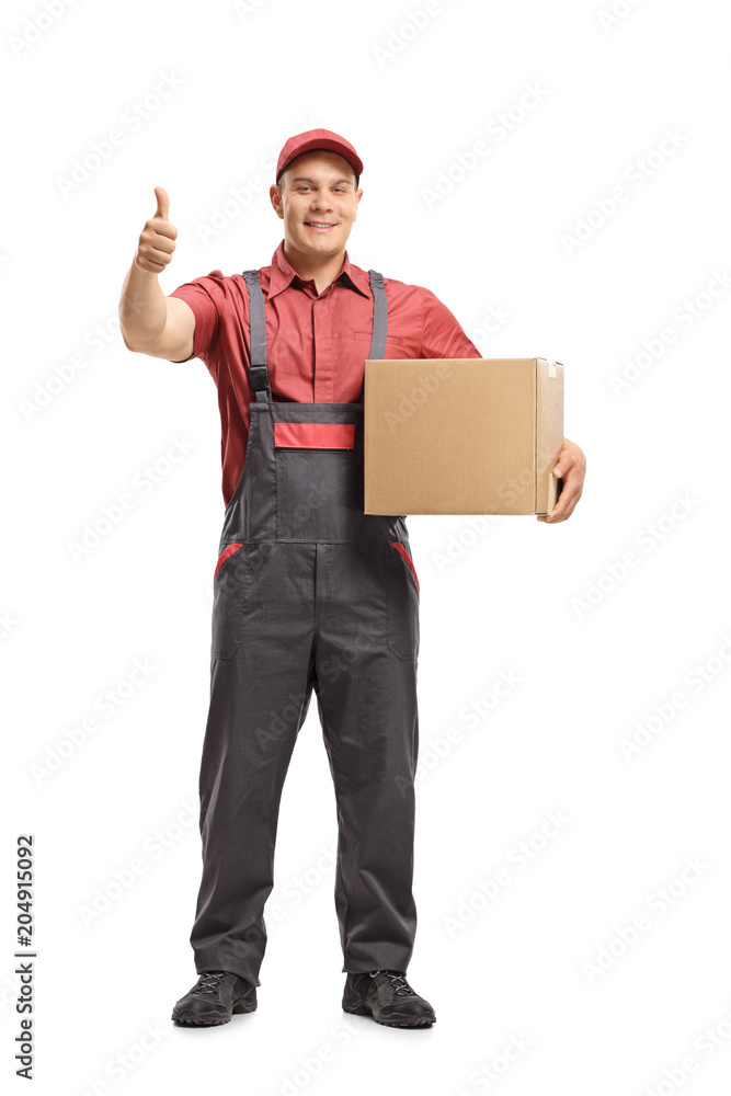 Mover holding a package and making a thumb up sign Mover holding a package and making a thumb up sign