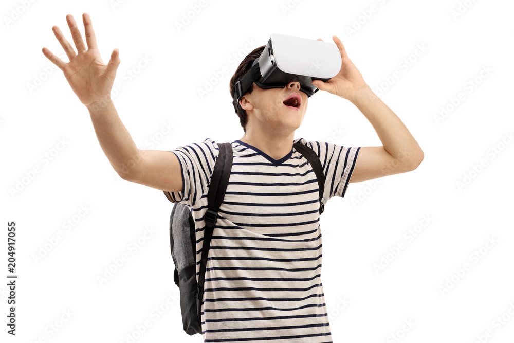 Teenage boy using a VR headset Teenage boy using a VR headset