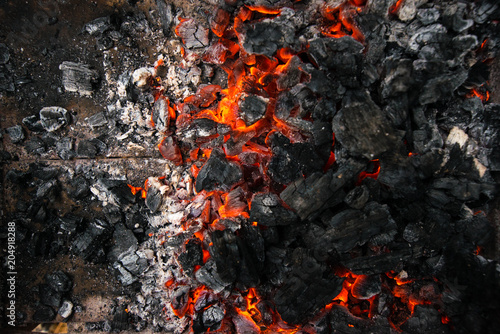Background of burning hot coals. Burning coals in the brazier.
