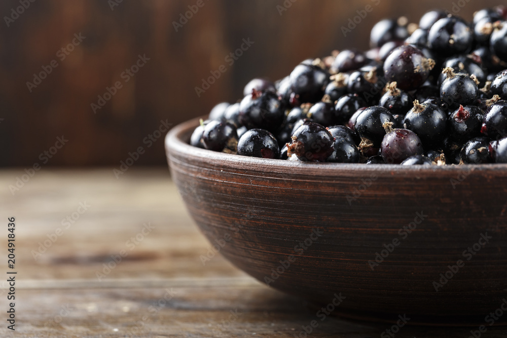currant on a wooden background currant on a wooden background