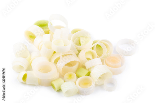 Fresh green leek chopped rings isolated on a white background