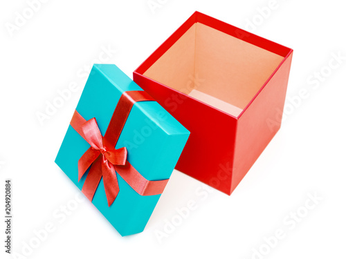 Red and blue gift box with ribbon isolated