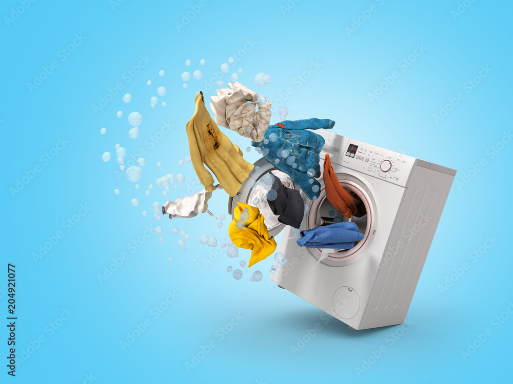 Washing machine and flying clothes on blue background