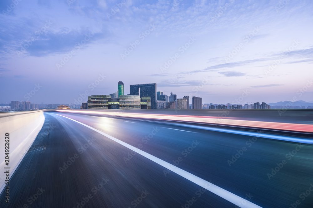 empty road with modern office building empty road with modern office building
