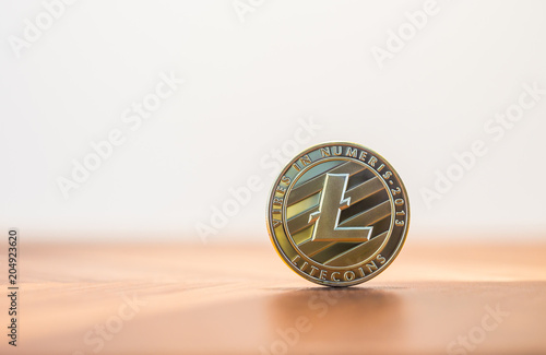 Cryptocurrency Litecoins digital money sign, white background. photo