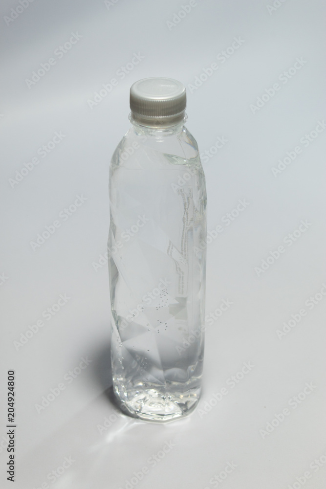 Clean drinking water packaged in clear plastic bottle. Clean drinking water packaged in clear plastic bottle.