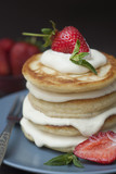 Dessert Pancakes with Cream and Strawbery. Health Breakfast Fruit Berry Vitamine Black Background