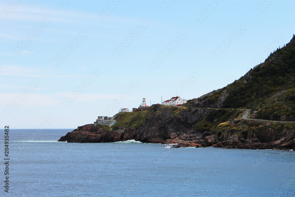 Fort Amherst lighthouse, Fort Amherst, St. John's, Newfoundland Labrador, Canada. View across St. John's Harbour at the Narrows.