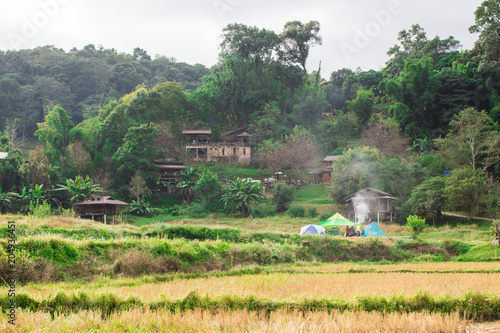 Hill tribe village And smoke rising from the cooking.