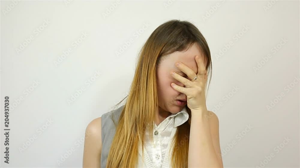 Portrait of a young beautiful woman. Frightened gesture Portrait of a young beautiful woman. Frightened gesture