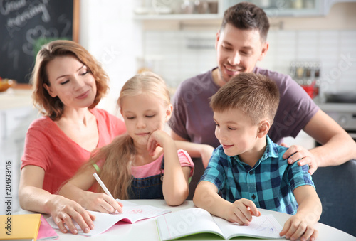 Little children with parent...