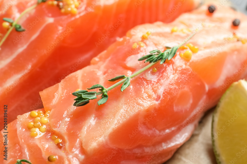 Fresh salmon with mustard and thyme, closeup Fresh salmon with mustard and thyme, closeup