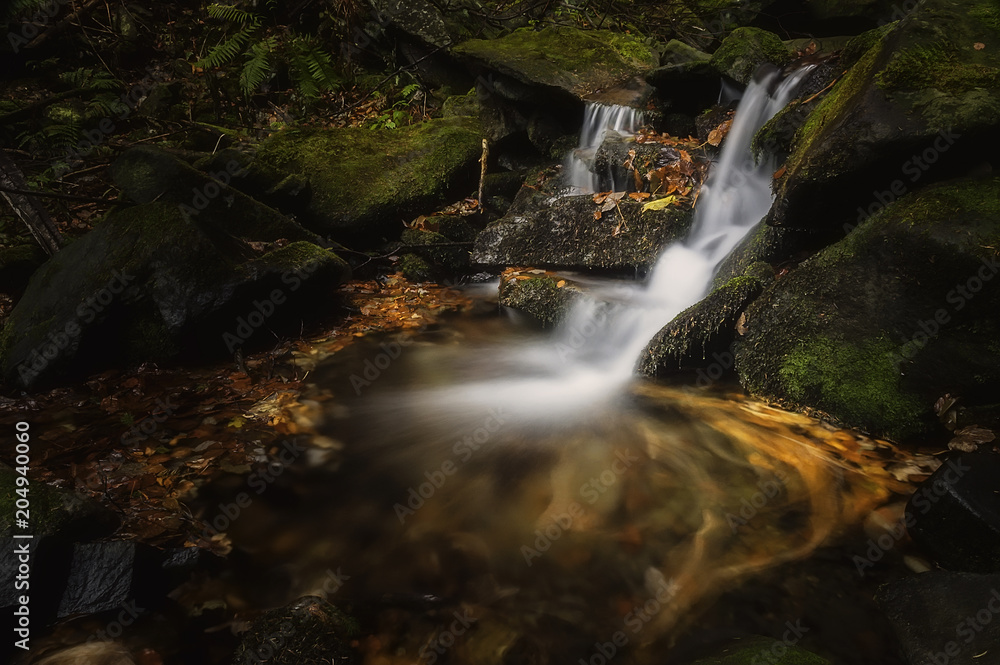 View of autumn waterfalls