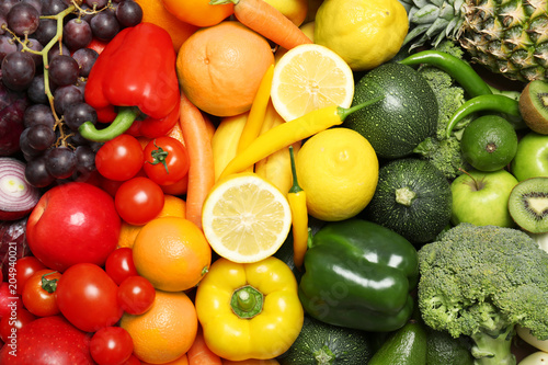 Fototapeta Naklejka Na Ścianę i Meble -  Rainbow collection of ripe fruits and vegetables as background, top view