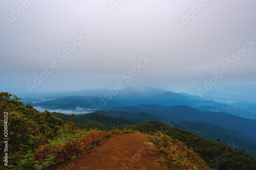 high mountains peaks range clouds in fog scenery landscape national park view outdoor at Chiang Rai, Chiang Mai Province, Thailand