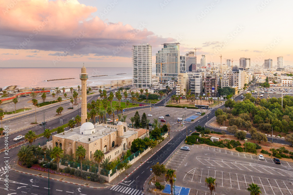 The beautiful city of Tel Aviv, Israel at dawn, beautiful against the Mediterranean The beautiful city of Tel Aviv, Israel at dawn, beautiful against the Mediterranean